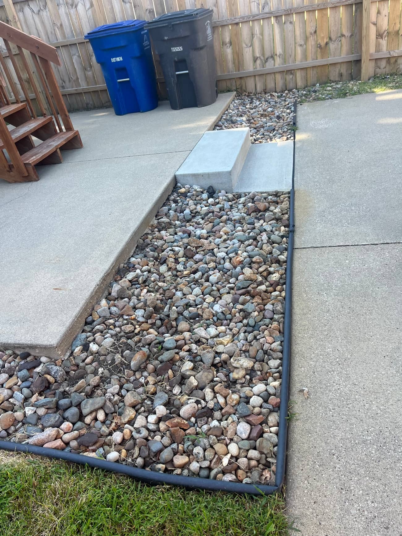 hardscaping project in between sidewalk and front deck
